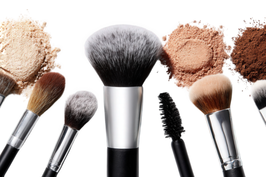 Overhead Close-up of an Assortment of Makeup Brushes and Powder