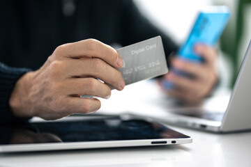 Man using credit card and paying via mobile banking app. Internet payment, online shopping, concept.