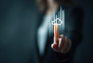 Blurry image of a person reaching toward a glowing cloud icon with vertical bars behind it on a dark backdrop