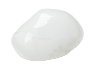 Smooth white stone glistening under soft light on a plain background