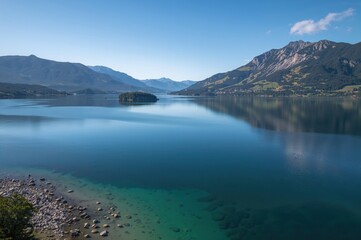 Bird's-eye perspective of a mountain-ringed lake