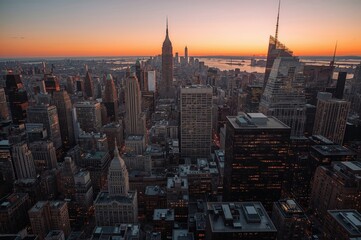 Sunset aerial perspective of a bustling urban center featuring a grand cathedral