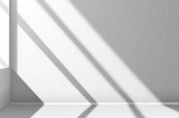 White room corner bathed in sharp sunlight. Simple, minimal, geometric, modern look with contrasting light and shadow. High key lighting