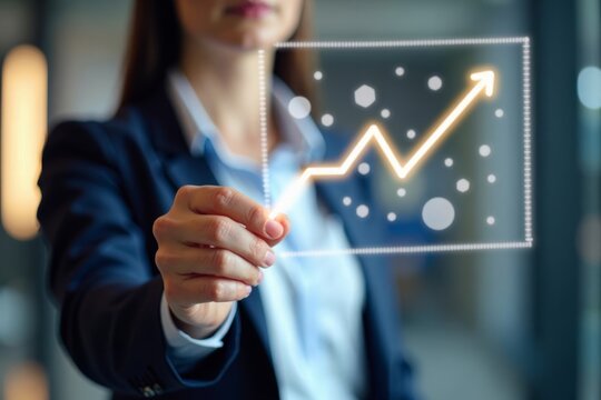 Businesswoman creating virtual graph with augmented reality technology.