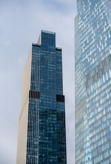 Fototapeta premium walls and windows of high business building bottom view