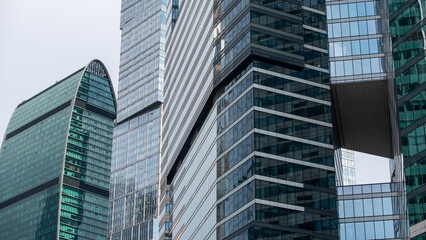 Fototapeta premium walls and windows of high business building bottom view