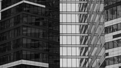 Obraz premium walls and windows of high business building bottom view