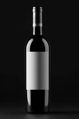 Red wine bottle with a blank white label on a dark surface, minimalist, elegant