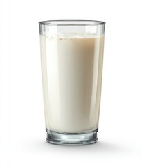 A tall glass filled with creamy white liquid, probably milk, sitting on a white surface with a soft shadow
