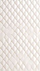 Fototapeta premium White quilted fabric with diamond pattern and gold studs