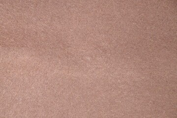 Soft pink brown felt fabric texture background close up
