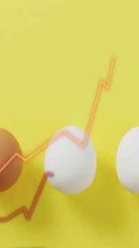 Line graph animation over white and brown eggs on yellow background