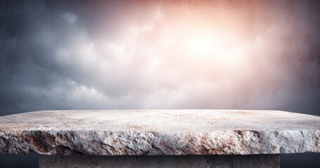 A weathered stone ledge against a dramatic sky with light breaking through the clouds. Ideal for product mockups or landscape backgrounds