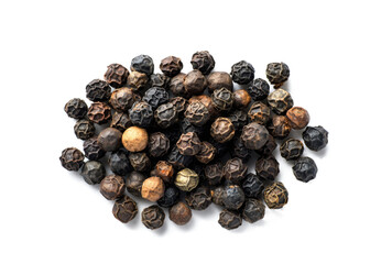 Obraz premium Black peppercorns scattered on a white background, top view