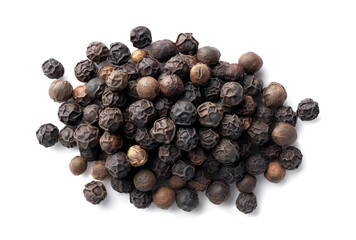 Obraz premium Black peppercorns scattered on a white background, top view