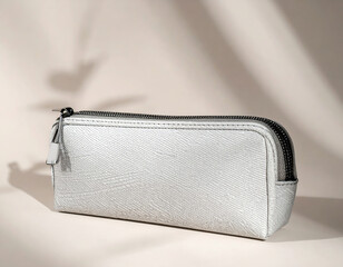 White leather pencil case on neutral background