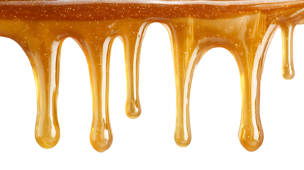 Golden honey or caramel drips isolated on transparent background.