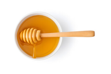 Honey Dipper in a Bowl of Honey Overhead View Natural Sweetener for Cooking Baking and Healthy Recipes
