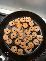 Shrimp cooked in the pan with spices.