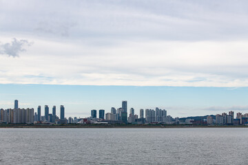 Fototapeta premium view of the seaside city with skyscrapers