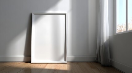 A light-filled room displays a white picture frame against a pale wall, bathed in natural light.