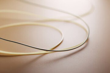 delicate winding lines gracefully traverse pristine background creating captivating visual flow