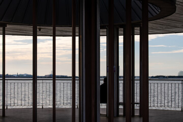 view of the observatory with tourists against the cloudy scape