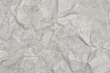 Obraz premium Distressed recycled paper texture with a horizontal layout and grunge effect. Faded retro newspaper backdrop. Wrinkled paper surface with room for writing.