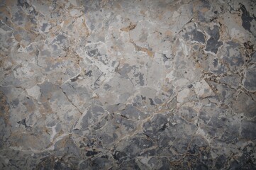 Naklejka premium Timeless charm radiates from gray marble's subtle and refined look, showcasing hues from gentle light grays to rich charcoal shades with delicate variations.