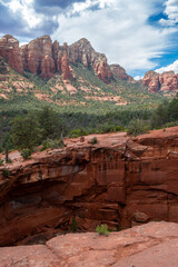 Dramatic cloudscape and sinkhole at Devil's Kitchen in Arizona