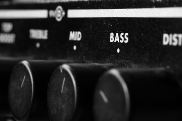 This guitar effects pedal features tone control knobs for highs, mids, and lows, allowing you to...