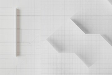 Checkered grid paper displayed on a plain white surface. Structured layout for engineering diagrams. Geometric square motifs.