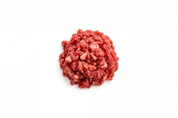 Raw ground meat displayed on a white surface