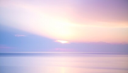 Fototapeta premium Soft Pastel Sunrise Over Calm Water