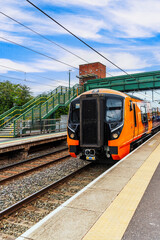 Obraz premium Electrified suburban passenger rural commuter railway line England UK