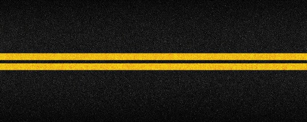 Two parallel yellow lines on dark asphalt (2)