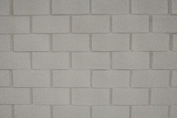 Naklejka premium Constructing a wall using foam blocks inside a residence