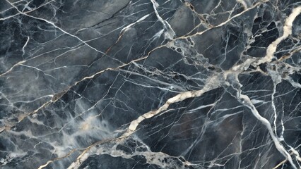 Fototapeta premium A refined close-up of polished dark gray marble, showcasing elegant white and light gray veining with smooth tonal depth. The luxurious stone texture is highlighted with soft, even lighting, making it