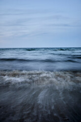 Waves of the baltic sea at the beach, long exposure