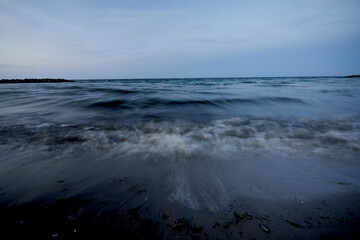 Waves of the baltic sea at the beach, long exposure