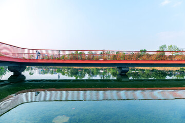 The bridge building spanning the lake in Chengdu Jincheng Lake Park