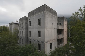 A gray home in a suburban neighborhood reflecting Eastern European style