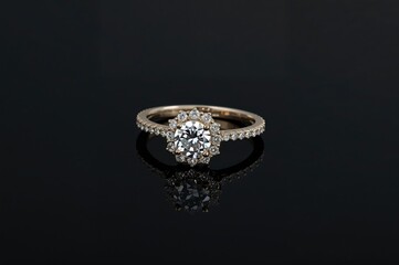 Black backdrop showcasing diamond rings