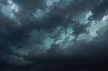 Ominous storm clouds gathering under a moody dark sky before heavy rain