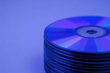 Close-up of CDs with a gentle blur