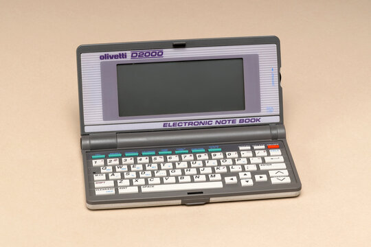 Pavia, Lombardy, Italy - December 27, 2024: Olivetti D2000 Electronic Note Book from 1990, PDA (Personal Digital Assistant) with flashlight batteries. Shown at CTRL+ALT Museum