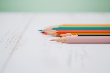 Close-up of colored pencils for a gentle backdrop