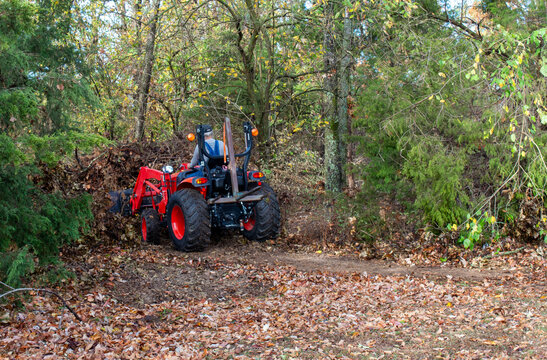 Storm clean up using tractor