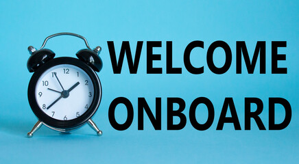 Welcome onboard symbol. Concept words Welcome onboard on Beautiful blue background with alarm clock. Business and Welcome onboard concept. Copy space.
