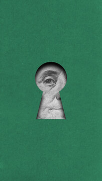 Creative composition. Eye of Benjamin Franklin behind keyhole on green background. Concept of money secrecy, surveillance, financial control, hidden wealth, and economic privacy.